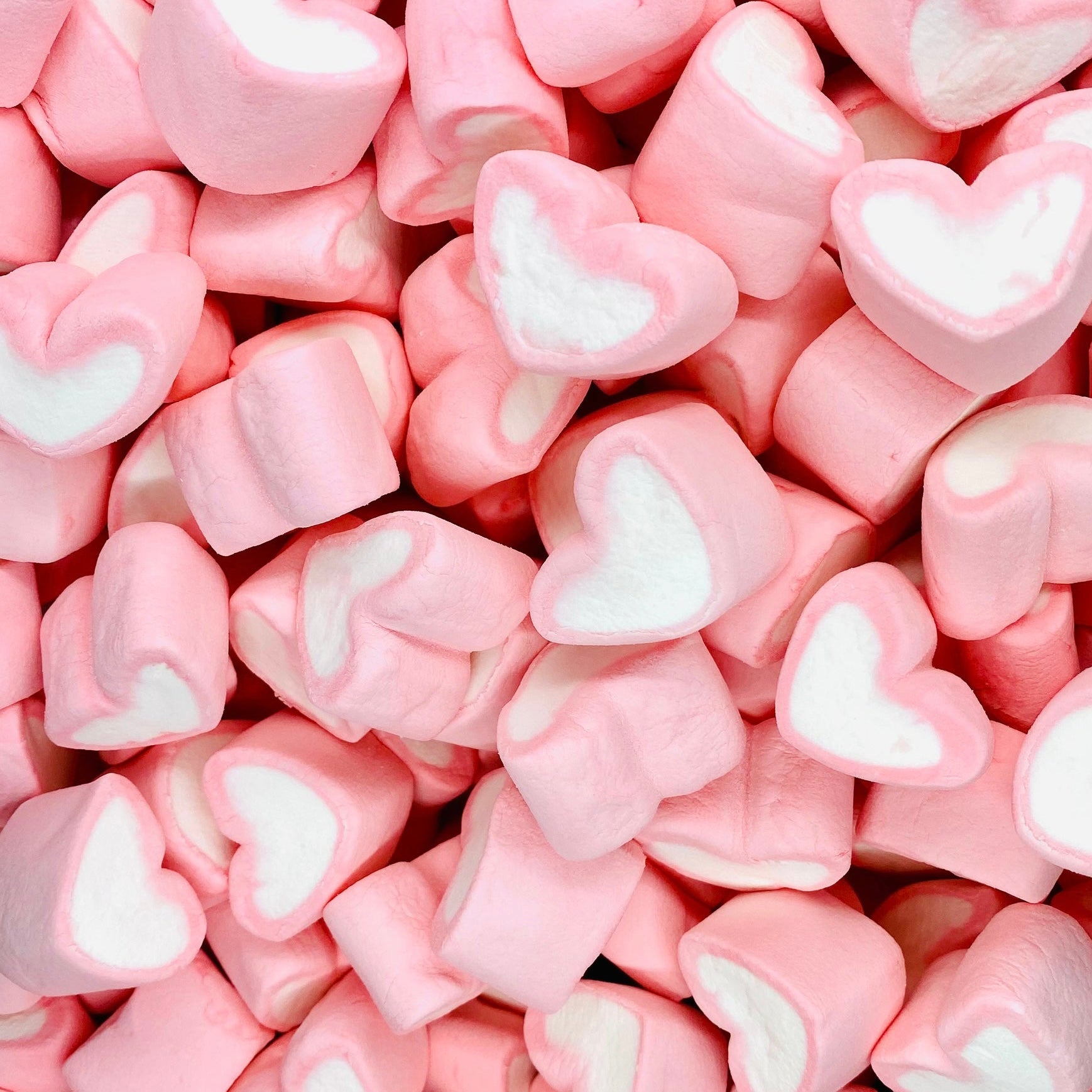Pink heart shape marshmallow love hi-res stock photography and